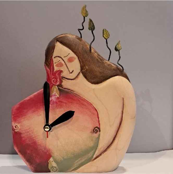 مجسمه چوبی دکوری مدل ساعت اناری